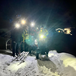 Trekking al chiaro di luna con cena in rifugio e slittata